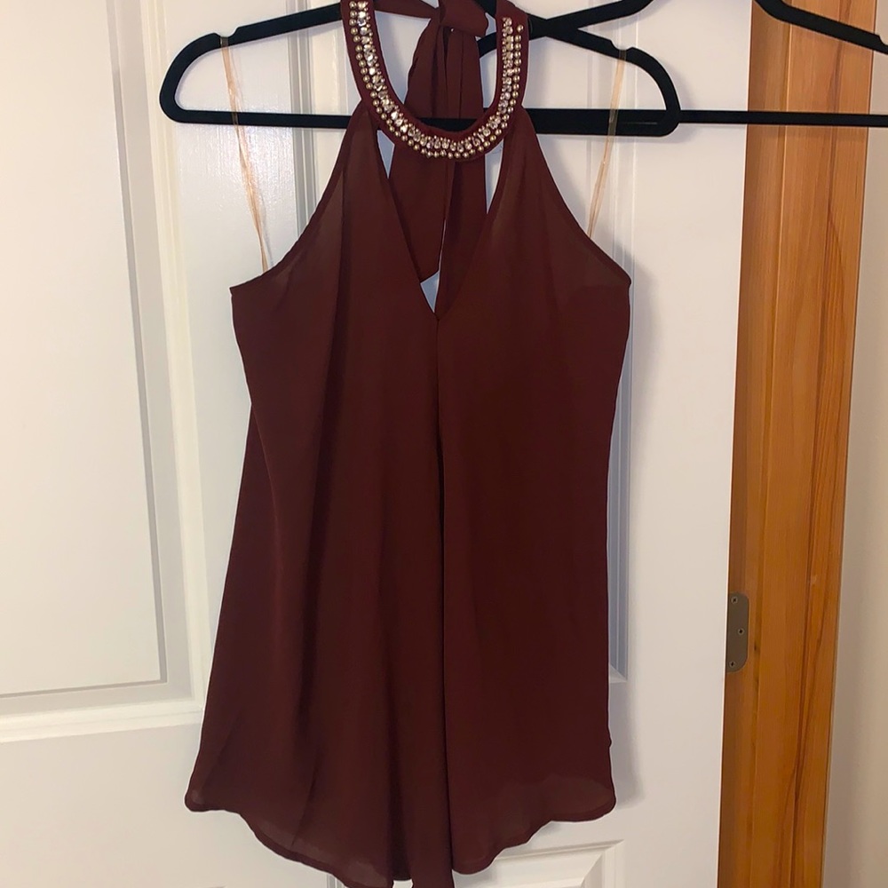 V-neck blouce rine stones with open back